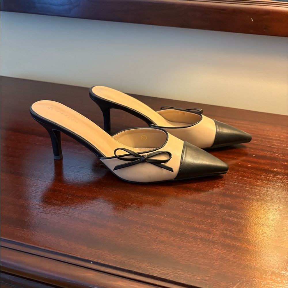 Chic Black and Cream Pointed Toe Heels